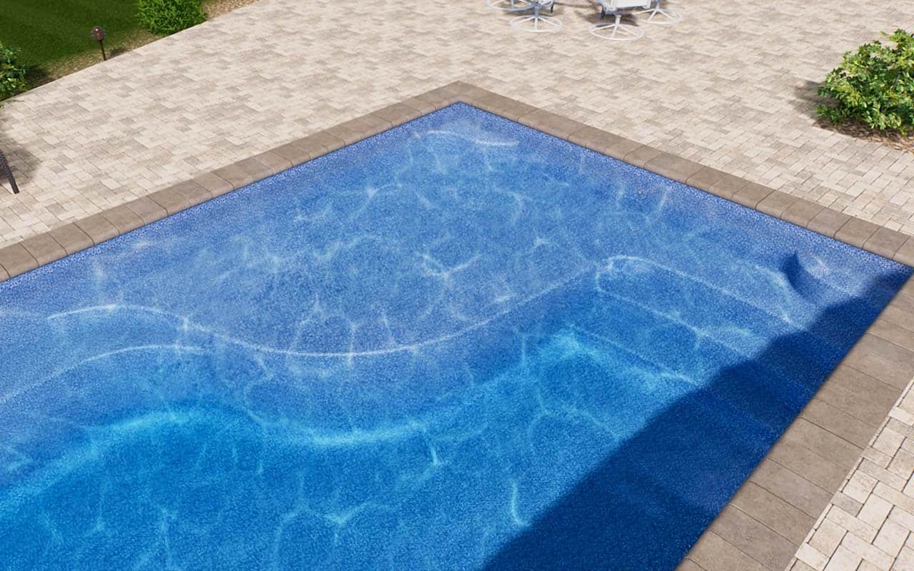 Aerial view of a fiberglass swimming pool and surrounding deck